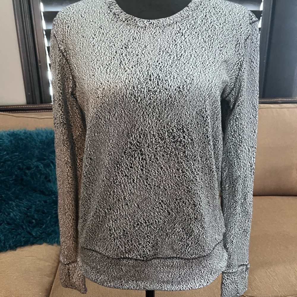 Size 6 top that can be worn going out. Like new.